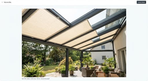 Pleated fabric blinds fitted directly under laminated glass veranda roof panels providing soft cream diffused light